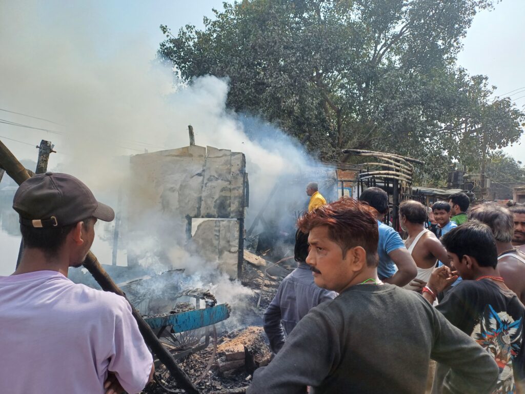 Burnt refrigerators and other damaged goods after a fire outbreak in Laheriasarai.