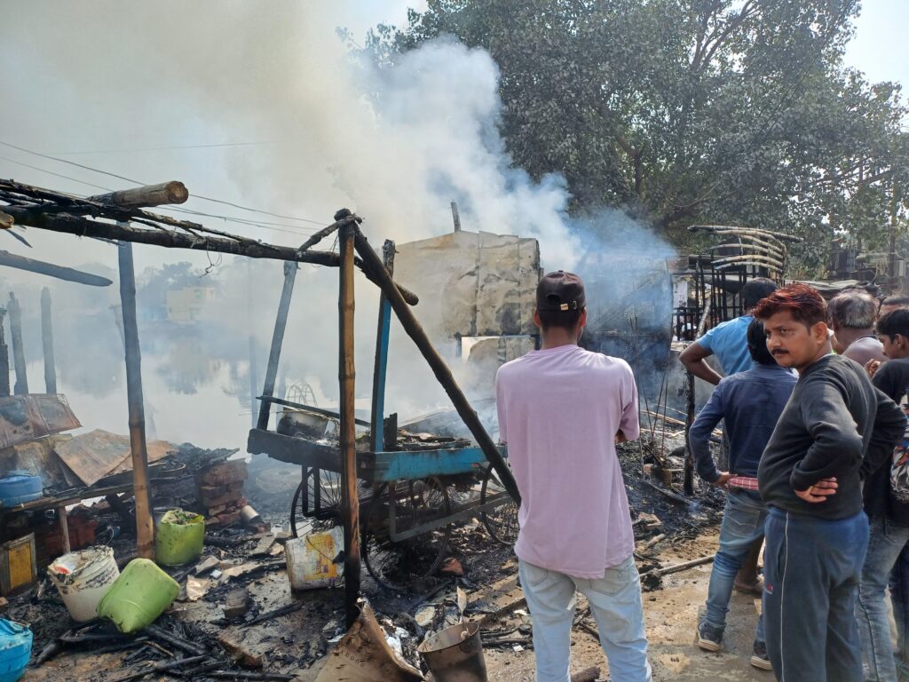 Smoke rising from a gas cylinder blast site in a crowded area of Laheriasarai.